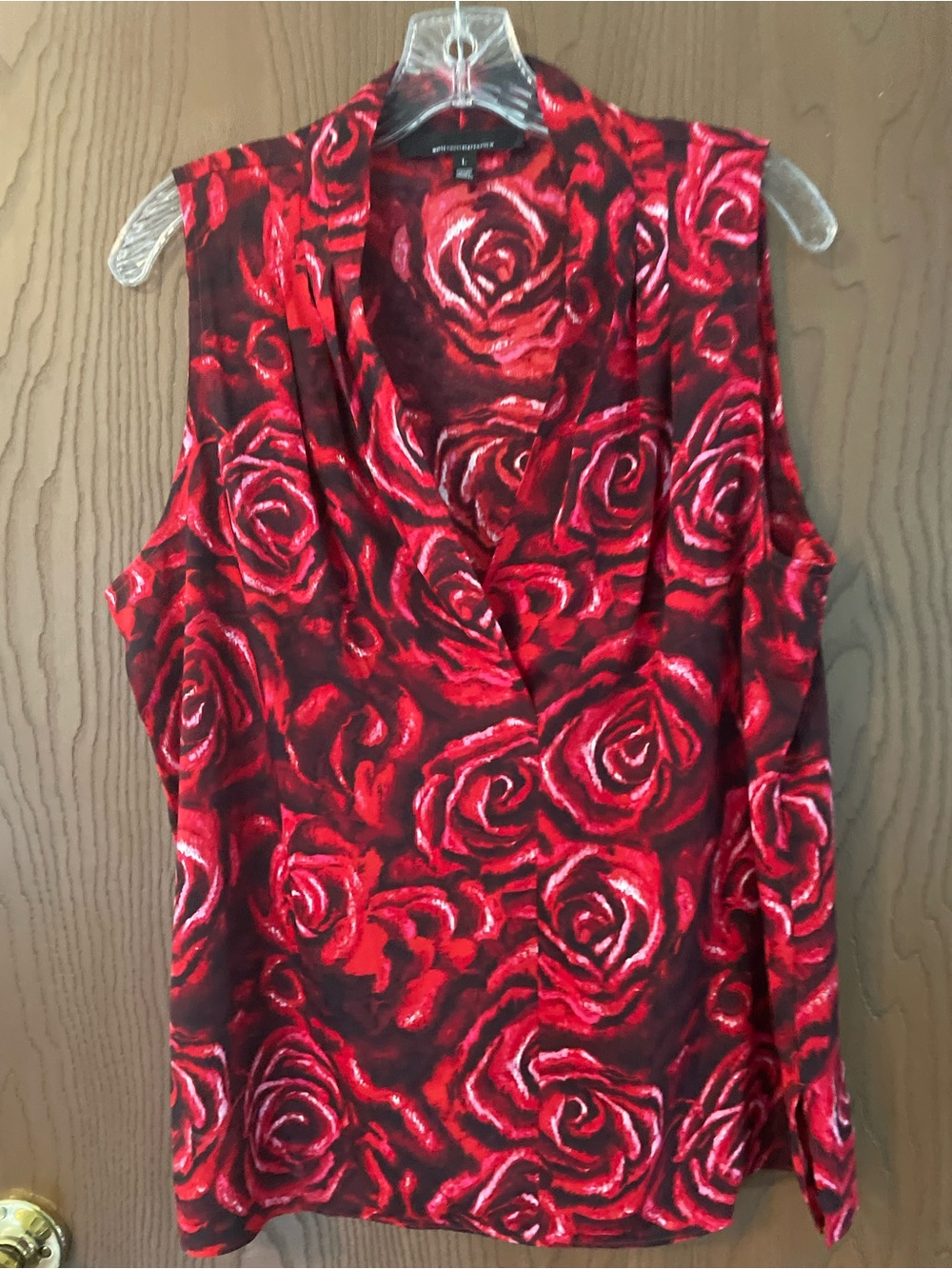 WHBM floral shell top. Size large.